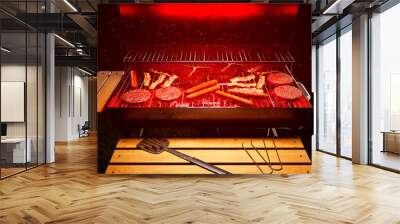 Grilling meat. Barbeque. Steaks, sausages, burgers. Grill with red hot charcoal. Wall mural