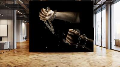 Hands breaking chains. Metal or steel chain is blown to pieces. Break free. Wall mural