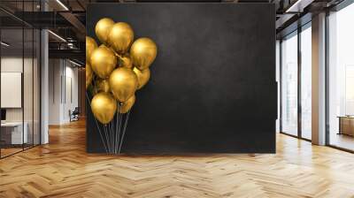 Gold balloons bunch on a black wall background. Horizontal banner. Wall mural