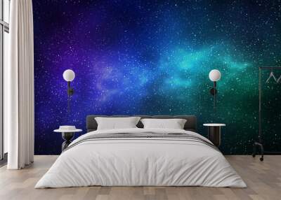 Night starry sky and bright blue green galaxy, horizontal background Wall mural