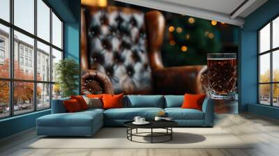 A luxurious brown leather armchair paired with a crystal whiskey glass on a wooden table evokes comfort, sophistication, and relaxation in a cozy living space. Wall mural