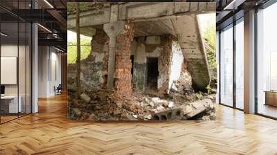 The ruins of building in old soviet army base in Latvia, Europe. Collapsed house. Wall mural