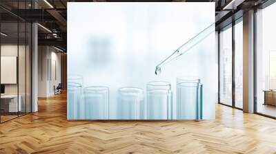 Liquid drop from pipette to test tube Wall mural