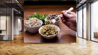 Nutrition concept - Healthy meals in glass jars over wooden background. Homemade mushroom and salad. Healthy food, Diet, Detox, Clean Eating or Vegetarian concept Wall mural