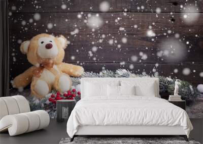 Decorative bear, christmas ball, berries and branches fur tree o Wall mural