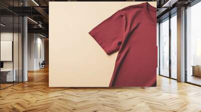 A simple maroon T-shirt mockup isolated on a soft cream background, leaving room for text on the right side, perfect for design mockups or product showcases. Wall mural