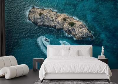 Jet Ski Adventure - Crafting the Letter L on Turquoise Waters Near a Rocky Island Wall mural