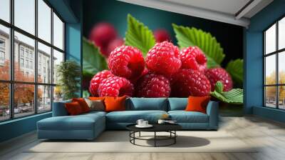 Many Ripe Red Raspberries are isolated on Greeen Background, Leaves, a wooden table, and Empty Space. Wall mural