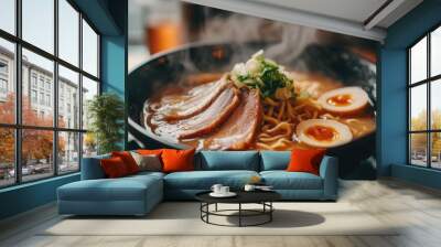 A steaming bowl of ramen with pork, egg, and scallions. Wall mural