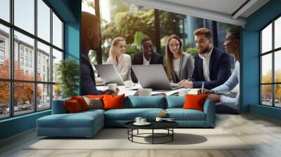 Group of employees meet together to discuss an ongoing project Wall mural