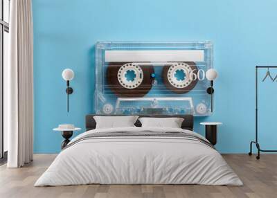 Vintage audio cassette on blue background Wall mural