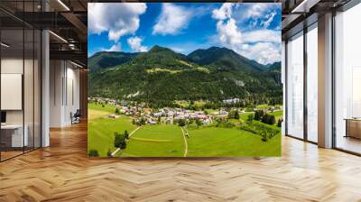 Gozd Martuljek town in Slovenia at summer with beautiful nature and mountains in the background. View of mountain landscape next to Gozd Martuljek in Slovenia, view from the top of Gozd Martuljek. Wall mural