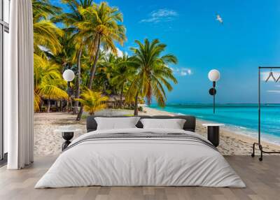 Paradise beach resort with palm trees and and tropical sea in Mauritius island. Summer vacation and tropical beach concept. Sandy beach with Le Morne beach on Mauritius island. Tropical landscape. Wall mural