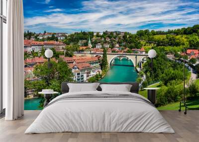 View of the Bern old city center and Nydeggbrucke bridge over river Aare, Bern, Switzerland. Bern old town with the Aare river flowing around the town on a sunny day, Bern, Switzerland. Wall mural