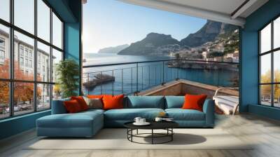 Luxurious villa nestled along the breathtaking Amalfi Coast of Italy, with panoramic views of the sparkling Mediterranean Sea and cliffside terraces Wall mural