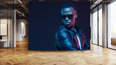 African male model portrait, wearing trendy sunglasses and leather jacket. Copy space for your text Wall mural