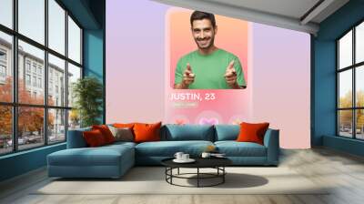 Dating app profile of handsome man pointing index fingers at camera Wall mural