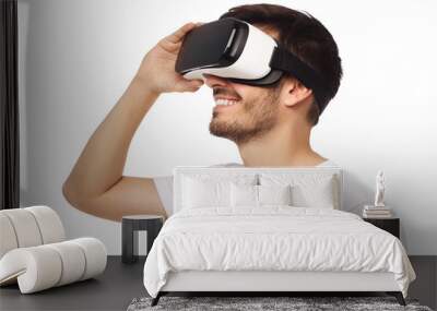 Handsome man experiencing virtual reality while using vr headset Wall mural