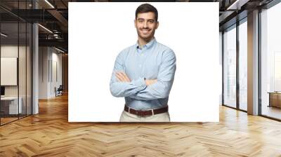 Handsome smiling businessman in blue shirt standing with arms crossed Wall mural