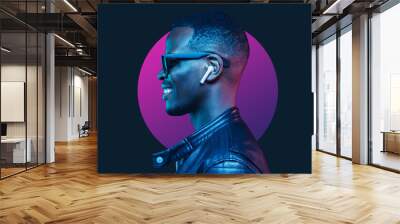 Neon portrait of smiling african american man listening music with earphones, wearing black leather jacket Wall mural