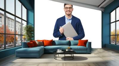 Smiling businessman looking at camera, holding closed laptop as if going to office Wall mural