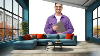 Young smiling modern male teacher holding laptop Wall mural