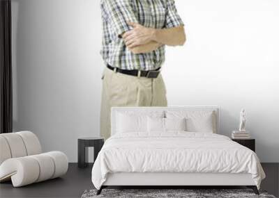 senior man with arms crossed. Wall mural