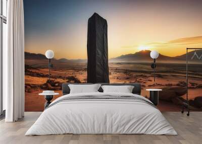 black monolithic rock in a desert landscape Wall mural