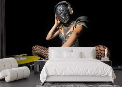 Masked female dj with turntables Wall mural