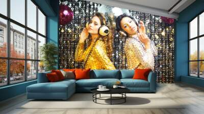 two beautiful sexy disco women in gold and silver catsuits danci Wall mural