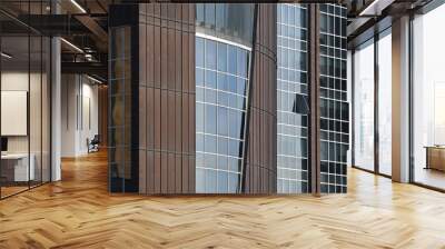 Architecture of a modern office building, construction background. Facade glass windows of a corporate center. Modern commercial buildings exterior. Wall mural