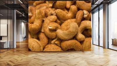 This is a closeup photograph of smoked cashews Wall mural