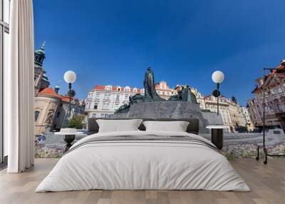 The Jan Hus Monument with the Church of Saint Nicholas in the background. Wall mural