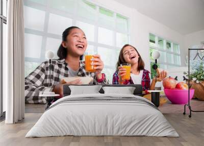 Teenage girls enjoy eating breakfast before go to school, Back to school concept Wall mural