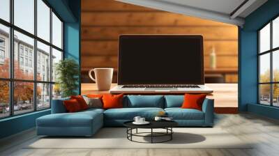 Laptop with blank screen on a wooden table in a meeting room Wall mural