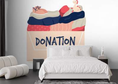 Cardboard box for donations full of clothing, toys Wall mural