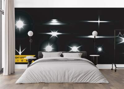 Flash light on black background. Vector glow sparkle effect. Abstract lens flare ignition. Flashing lights Vector Collection Wall mural