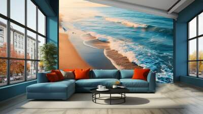 A high angle view of a pristine beach at dawn, with gentle waves and seagulls. Wall mural