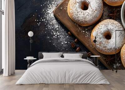 Breakfast with powdered sugar donuts buns and coffee on a black background viewed from the top with ample space for additional images or text Wall mural