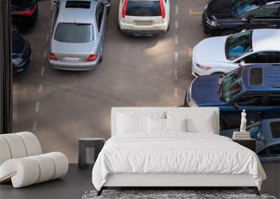 cars parked in a public parking Wall mural