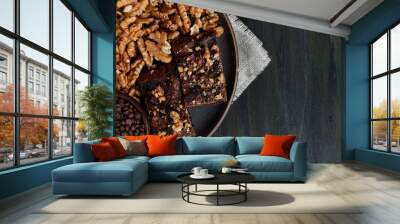 chocolate and walnut brownie next to walnuts and chocolate Wall mural