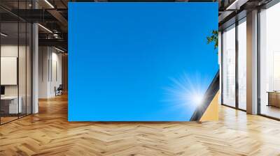 Clear cloudless bright blue sky in sunny day Wall mural