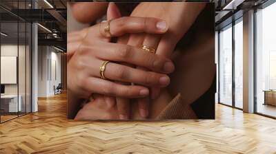 Close-up of female hands showing her golden rings. Horizontal mock-up. Wall mural