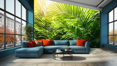 close-up of lush green tropical vegetation jungle with palm leaves in sunshine, beauty in nature banner concept for wallpaper Wall mural