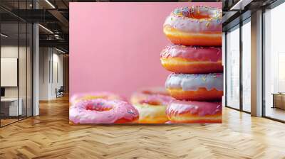 Colorful Assorted Donuts with Glaze and Sprinkles on a Vibrant Background Wall mural