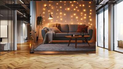 Cozy living room ambiance with warm floor lamp, table lamps, and string lights illuminating plush sofa, rug, and modern decorative elements in soft evening glow. Wall mural