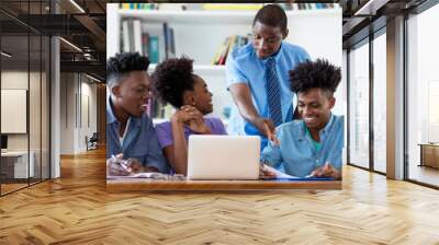 African american male professor with students Wall mural