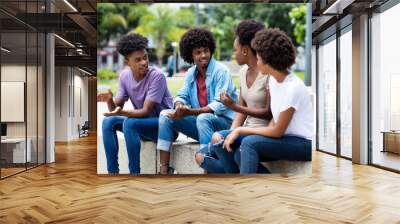 Group of african american young adults in discussion Wall mural