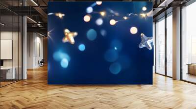 fairy lights on dark blue night sky for abstract party background, celebration backdrop concept with copy space Wall mural