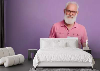 Full body elderly bearded gay man 50s years old wears pink shirt casual clothes hold card with be yourself title text look aside isolated on plain purple background. Lifestyle LGBT June pride concept. Wall mural